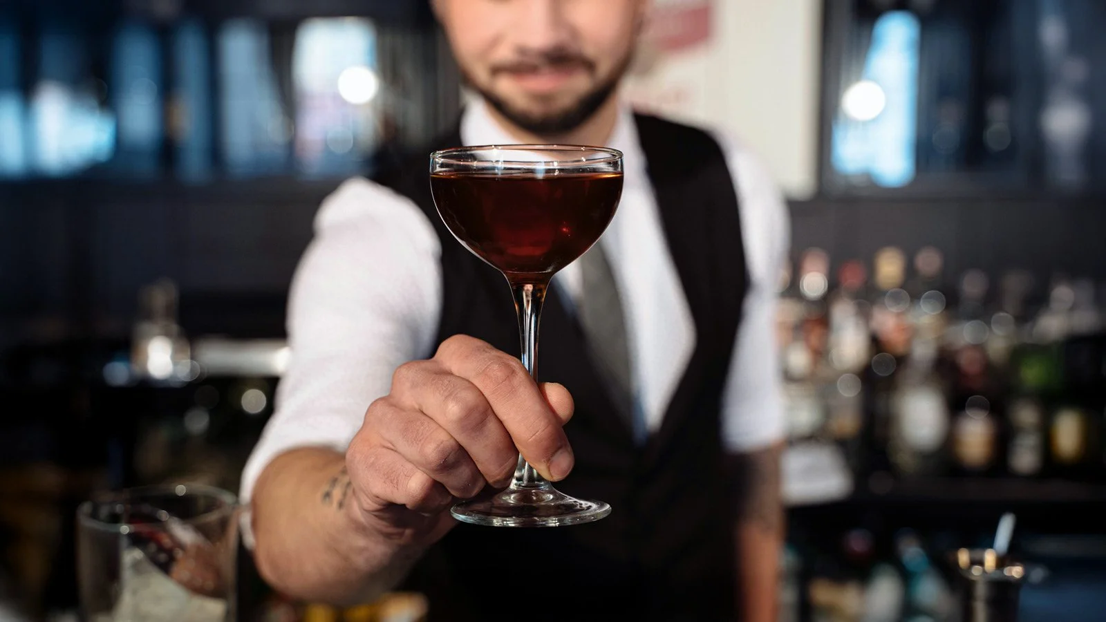 Bartender Holding a Cocktail